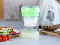 Kefirko cheese maker sitting on bench straining.