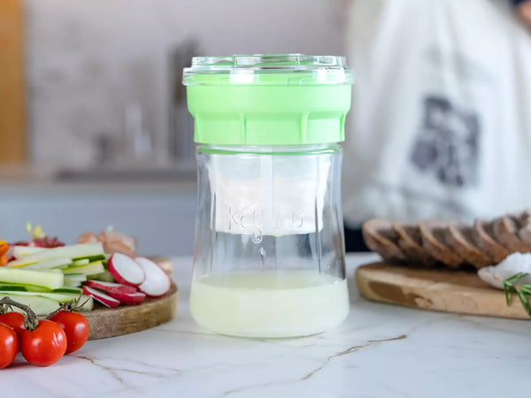 Kefirko cheese maker sitting on bench straining.