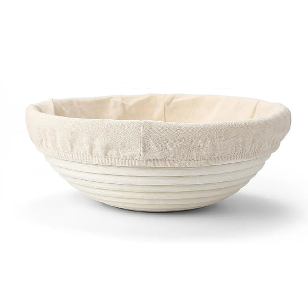 Round banneton proofing basket with unbleached liner for sourdough bread baking